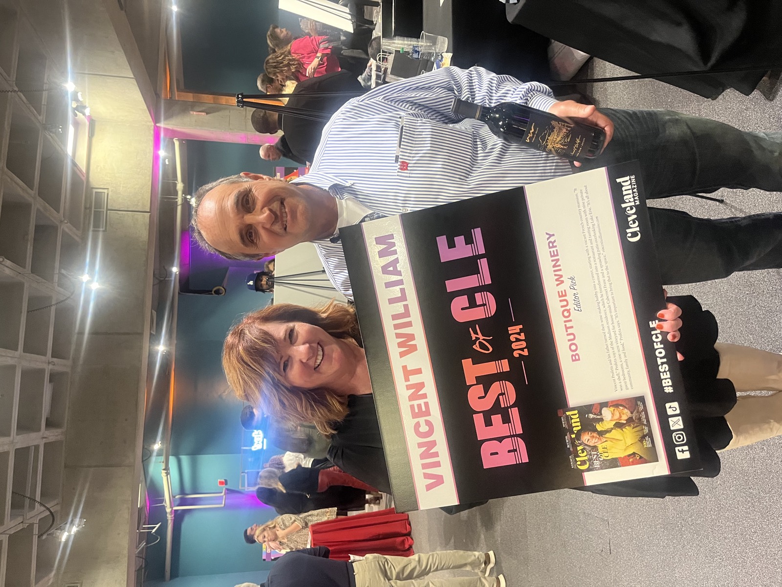 Michael and Katy Profeta holding the Vincent William Best of CLE award