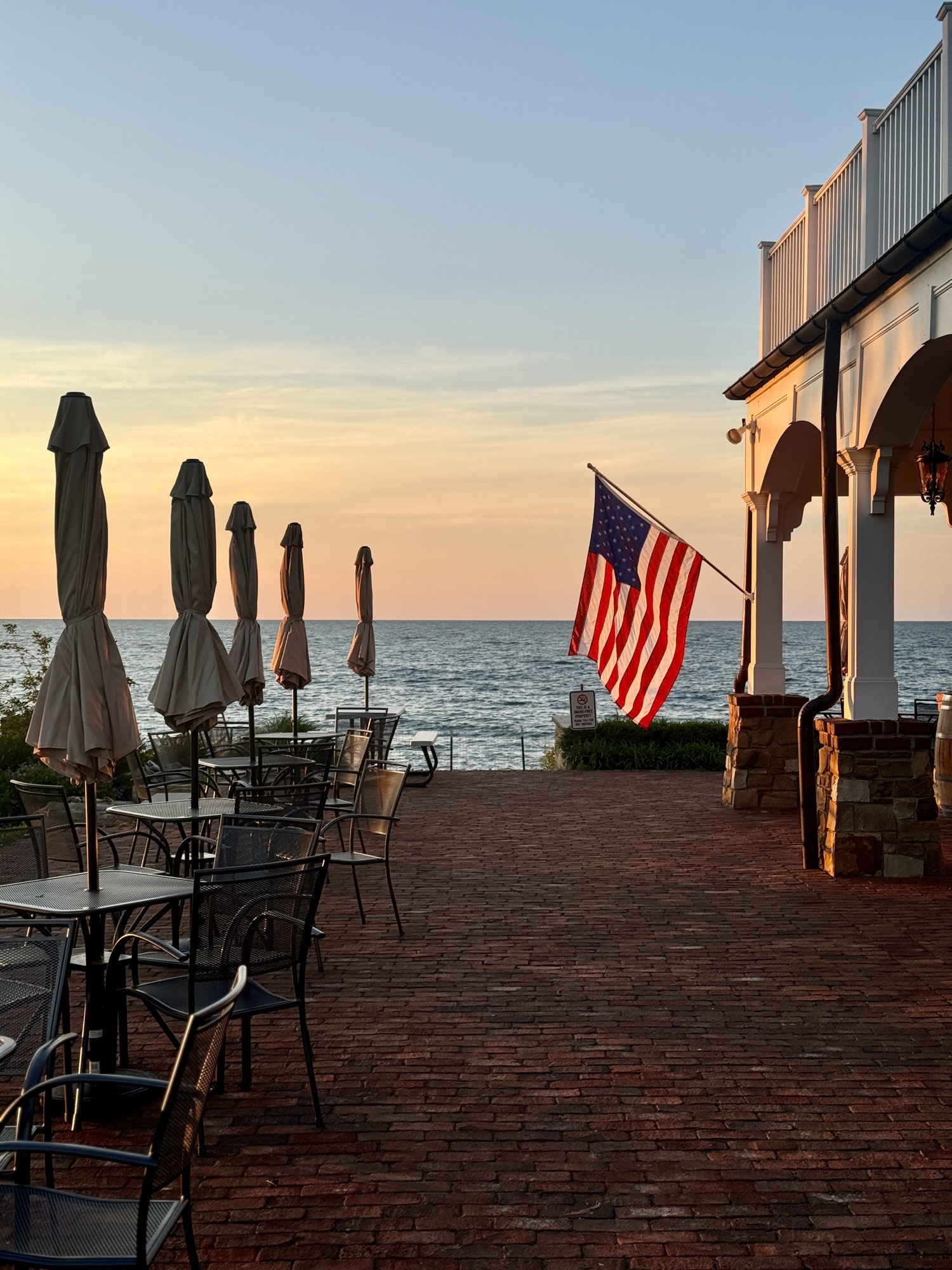 The patio at sunset above the lake